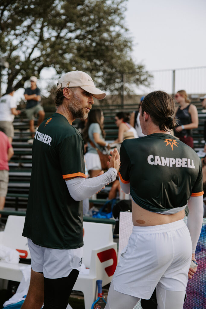 Travis Tettenmaier coaching a pickleball player during a private lesson at The Rattlesnake Pickleball.